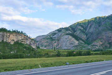 Road in the Altai Mountains, Siberia, Russia. Summer landscape. Beautiful photo wallpaper of nature.