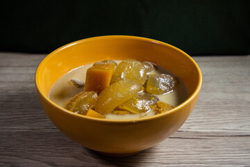 sweet kolak during the month of fasting or the month of Ramadhan, a typical Indonesian sweet dish, sweet coconut milk food, filled with kolang kaling, sweet potatoes and bananas