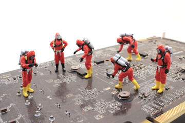 a Team of engineers repairing circuit board. Computer repair concept