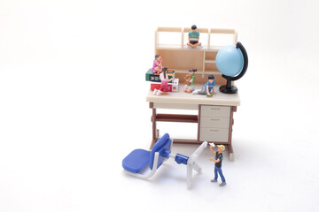 a scale of the student desk with children