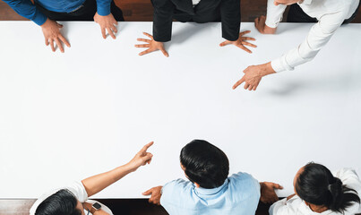 Panorama banner top view of office worker and businesspeople on meeting table pointing to empty...