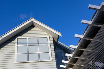 Facade of a wooden house at Ponsonby Road Auckland New Zealand. Rooftop. Modern Architecture. Wood construction.