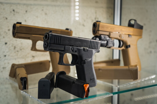 Baltic States, January 24, 2024. Glock 19x and 43x pistols on display in a store, close-up photo.