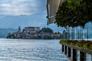 View on Isola San Giulio from an embankment, Lake Orta, Italy - 723579018