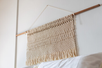 Hand made macrame decoration in the room
