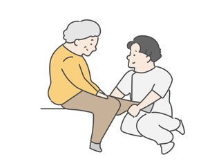 男性理学療法士と高齢女性