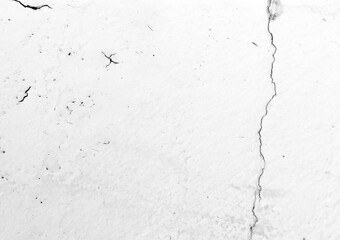 Peeling white painted concrete wall. Leaking rain cause the wall cracked. Water damaged the wall.