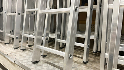 Aluminum stairs in the store, Stairs of ladder for construction in shop, New aluminum stepladders...
