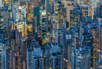 Aerial view of crowded high rise building in Hong Kong city at night - 723610266