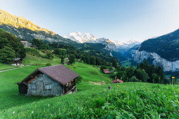 Wengen mountain village on bernese oberland and Lauterbrunnen valley with Jungfrau mountain in the evening at Switzerland