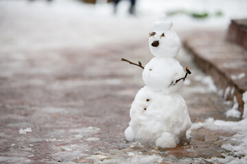 The little snowman is melting due to warming.