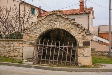 An 18th century Istrian stone bread oven in Premantura in Istria, Croatia. There were many in the past, but this is the only one remaining in town today
