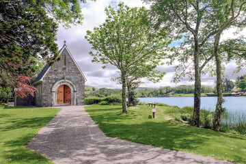 St. Finbarr's Oratory, a chapel on a small island in the lake in Gougane Barra scenic valley. Shehy...
