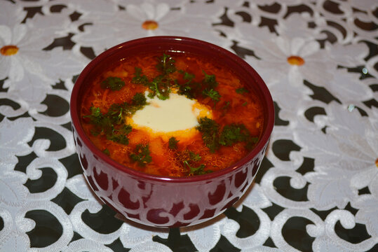 Bowl of delicious borch with sour cream. Russian cuisine soup