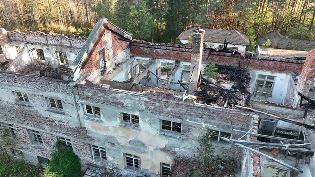 Ruined house. Ruined school building. Abandoned school in the forest