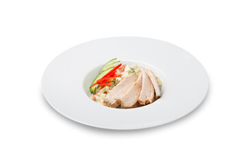 Olivier salad with chicken on a plate, isolated