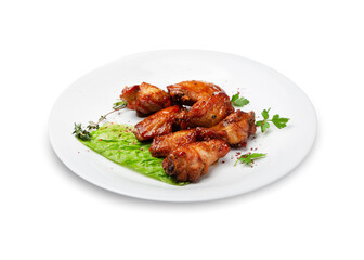 Fried chicken wings on a plate, isolated