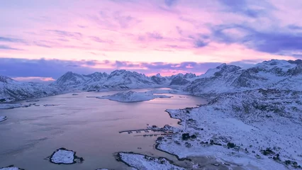 Fototapeten Lila Taken during the snow-covered winter season on the Norwegian Lofoten islands  © Aytug Bayer