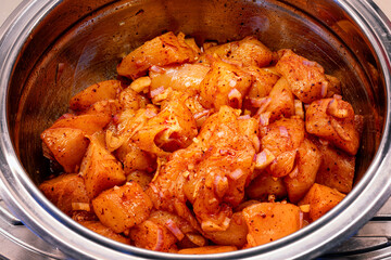 Preparation of chicken curry marinade. Spicy recipe.