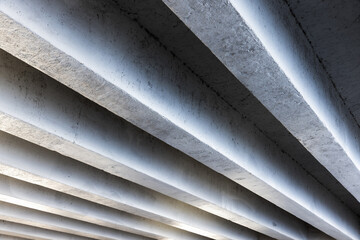 Bottom concrete details of an overhead bridge span. Abstract photo