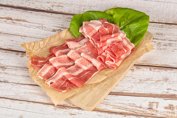 Sliced pork bacon in the bowl