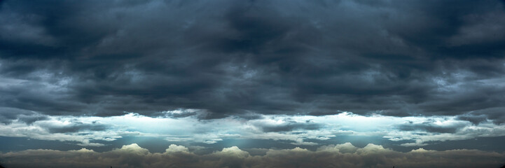 Banner Dramatic dark storm clouds black sky background. Dark thunderstorm clouds rainny season....