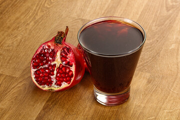 Sweet pomegranate juice in glass