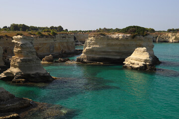 Fototapeta na wymiar The Beautiful cliffs of Torre Sant'Andrea in Salento - Puglia