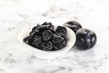 Dry prunes in thw bowl
