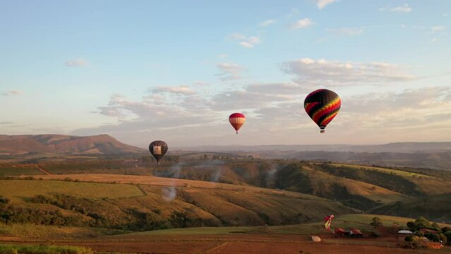 Drone view of the flight of three balloons at the Balloon Festival in Serra da Canastra in the interior of Minas Gerais, Brazil