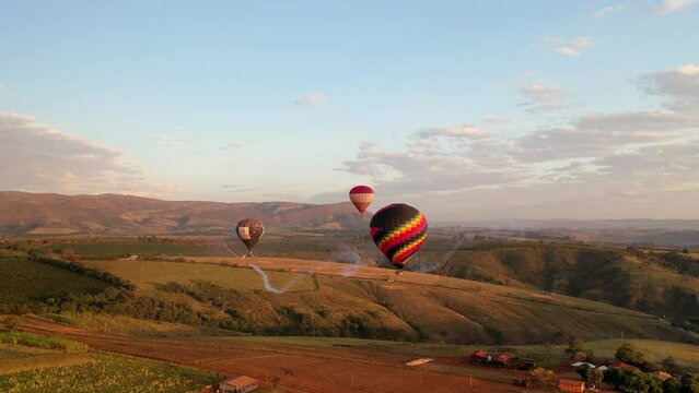Drone view of the flight of several balloons at the Balloon Festival in Serra da Canastra, in the interior of Minas Gerais, Brazil