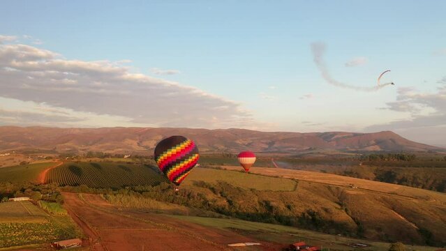 Drone view of the flight of several balloons at the Balloon Festival in Serra da Canastra, in the interior of Minas Gerais, Brazil