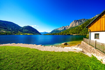 View of Lake Toplitz and the surrounding landscape. Idyllic nature by the lake in Styria in Austria. Mountain lake at the Dead Mountains in the Salzkammergut.
