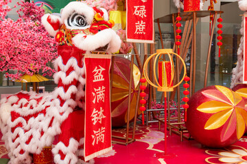 Chinese new year decorations at horizontal English translation of the characters are rolling in money and go like clockwork