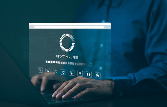 Update software application and hardware upgrade technology concept. User is using laptop software update or operating system upgrade, updating progress bar on computer screen, Install app patch,
