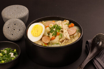 Chicken Sopas is Filipino Style Chicken Macaroni Soup with Flaked Chicken, Vegetables and Sausages.