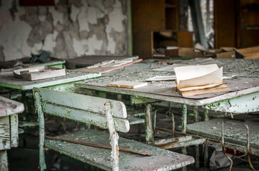 school room desk and book in Chernobyl close up