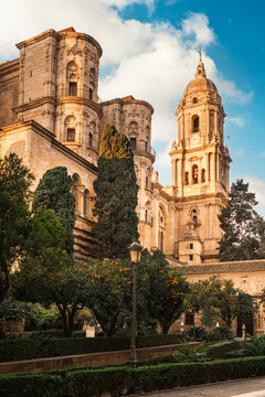 View of the north side of the Cathedral church (Catedral de la Encarnacion) of Malaga, Spain. The construction of the cathedral started in the 16th century, and it remains unfinished to this day.