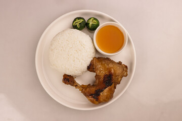 Chicken Inasal is a Filipino Style BBQ Chicken from the Western Visayas Region of the Philippines, Served with Rice.