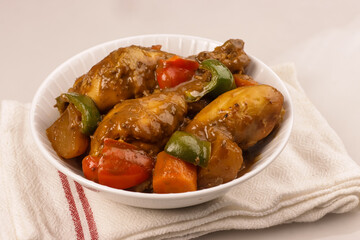 Chicken Caldereta or Kalderetang Manok Is Filipino Stew Chicken in Spicy Tomato Sauce with Liver Paste.