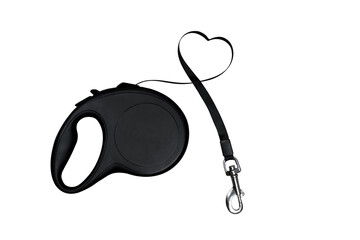 Isolate black retractable dog leash is laid out in the shape of a heart