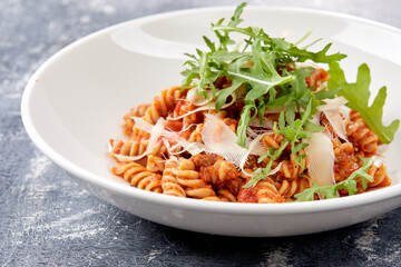pasta bolognese on the white plate