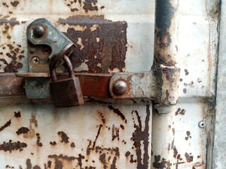 Rusty white metal door. rusty iron texture. Suitable for rusty background themes