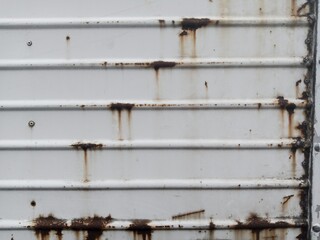 Rusty white metal door. rusty iron texture. Suitable for rusty background themes