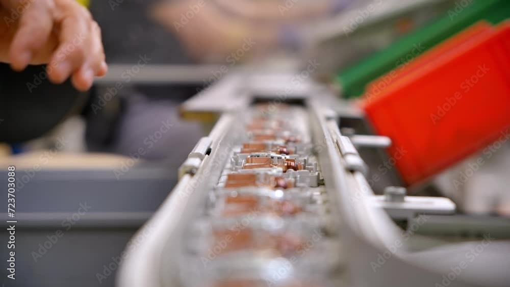 Poster work on an assembly line in a factory