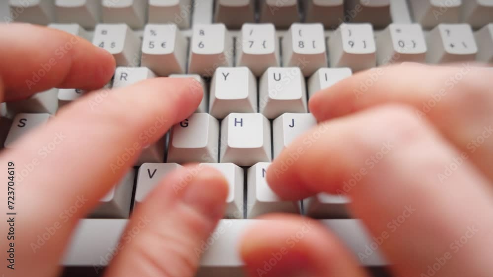Poster man typing on a keyboard. point of view. close up