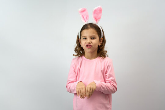 Cute little child wearing bunny ears on Easter day
