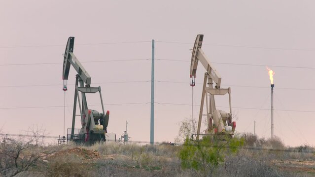 Oil wells pumping in Pecos Texas in January of 2024.
