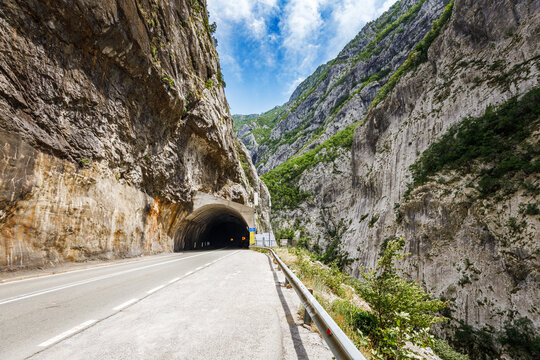 Mountain landscape of Montenegro with road and tunnel