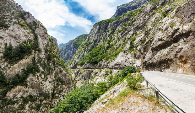 Panoramic mountain landscape of Montenegro with road and canyon